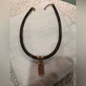 Henry Bendell brown crackled leather cord necklace with crystal pendant